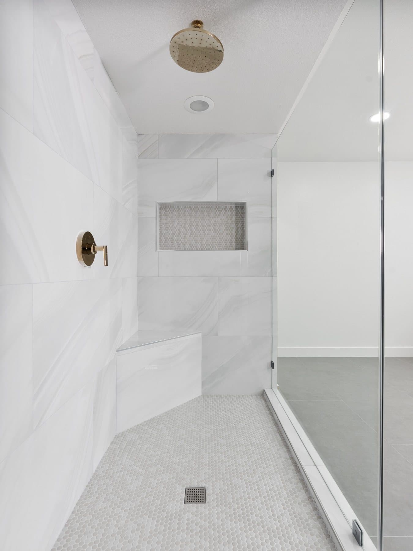 Lone Mountain bathroom remodel: shower interior with rain-head fixture and niche