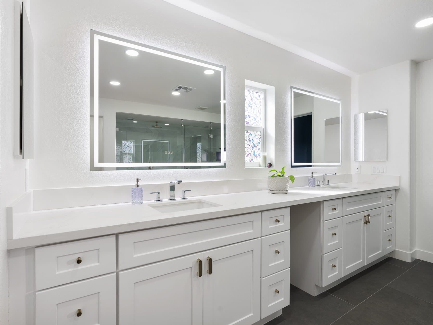 Lone Mountain bathroom remodel: double vanity with white cabinetry