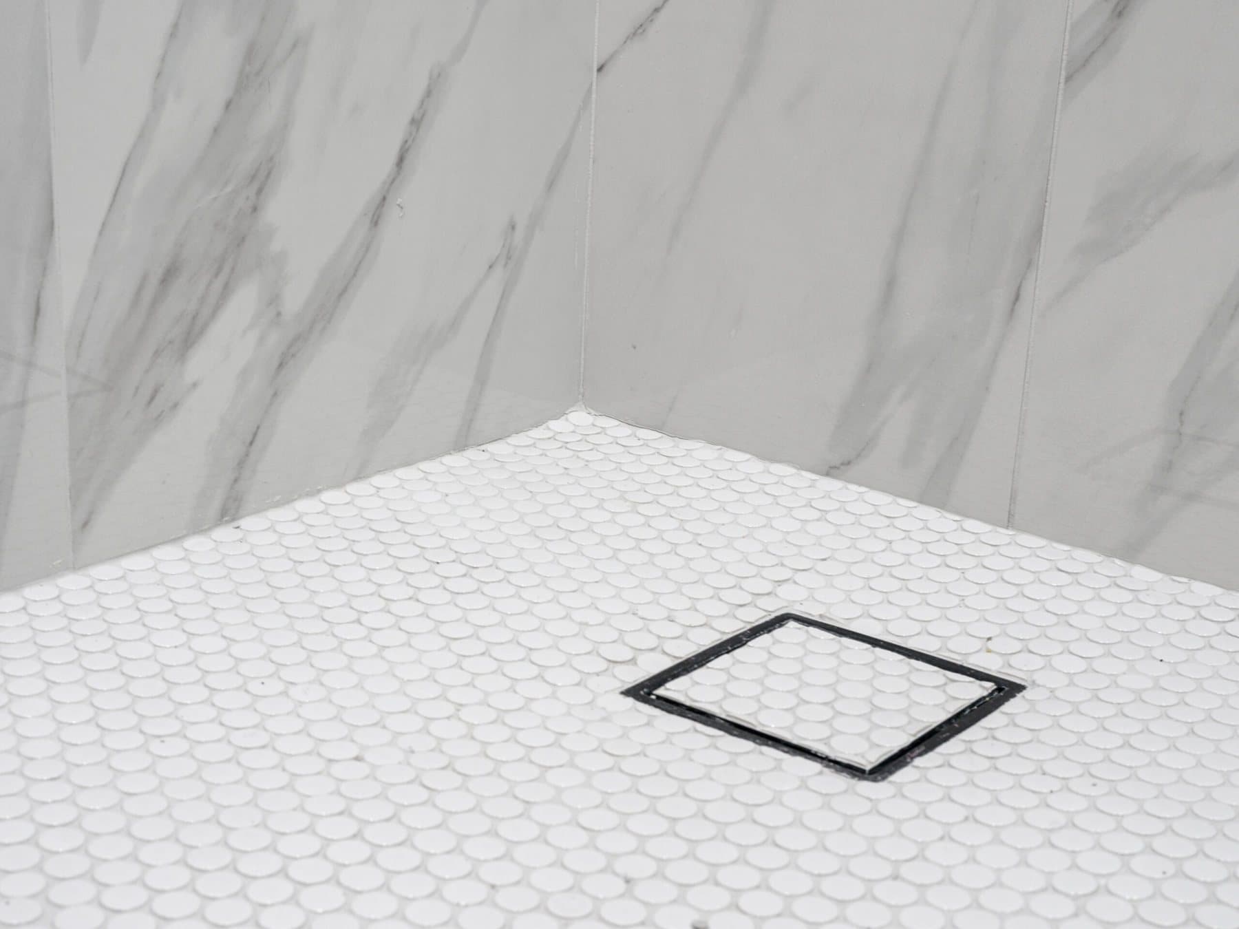 Summerlin bathroom remodel: penny-tile shower floor with square drain
